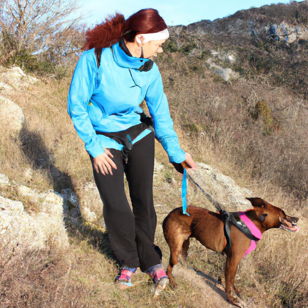 Woman hiking with dog outdoors