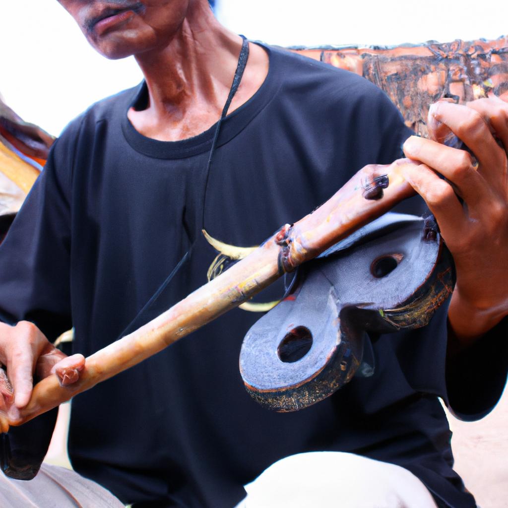 Man playing traditional musical instrument